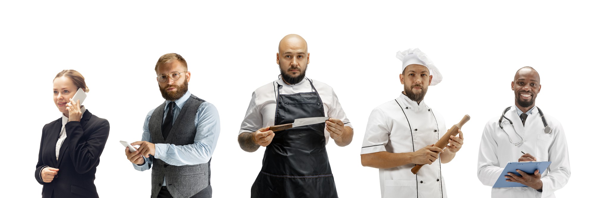 Chef consulting with restaurant team in warm kitchen